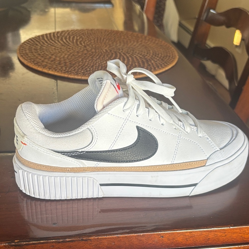Nike White Sneakers with Black Swoosh and Tan Stripe
